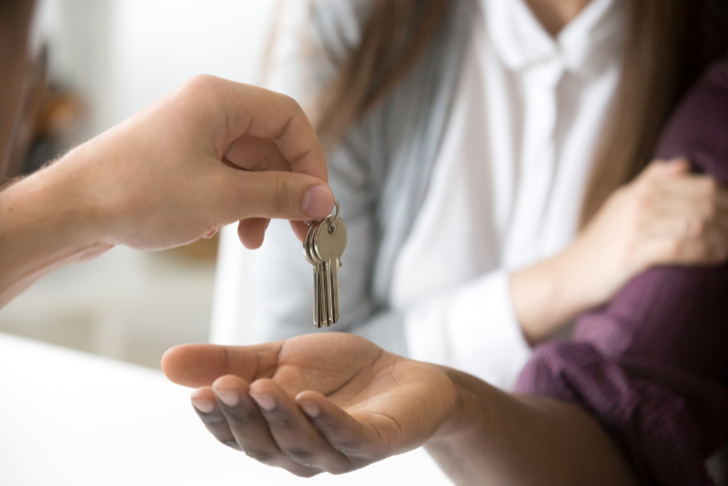 estate agent handing over keys